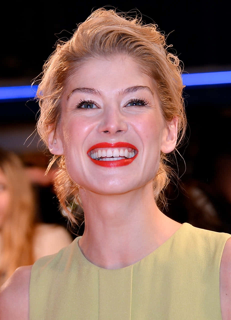 Elegant Rosamund Pike In A Black Dress