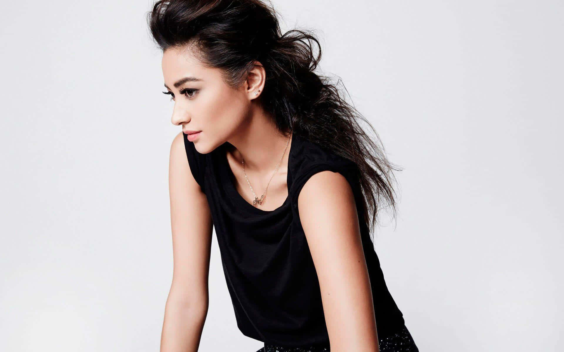 Elegant Side Glance Black Outfit Background