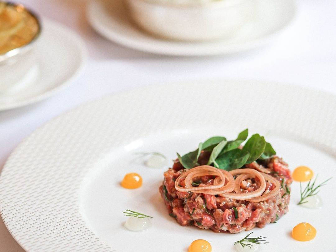 Elegant Steak Tartare With Confit Egg Background