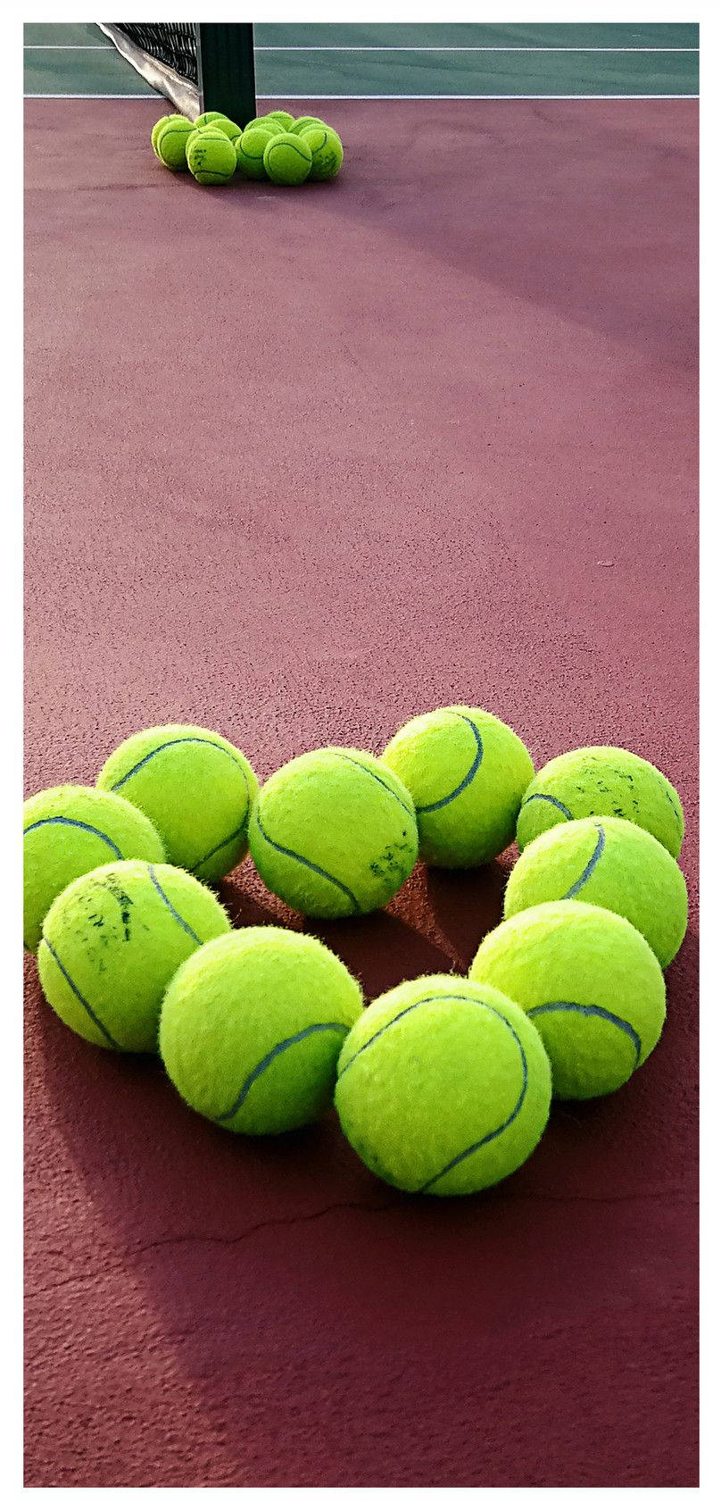 Elegant Tennis Ball On Smartphone Screen Background