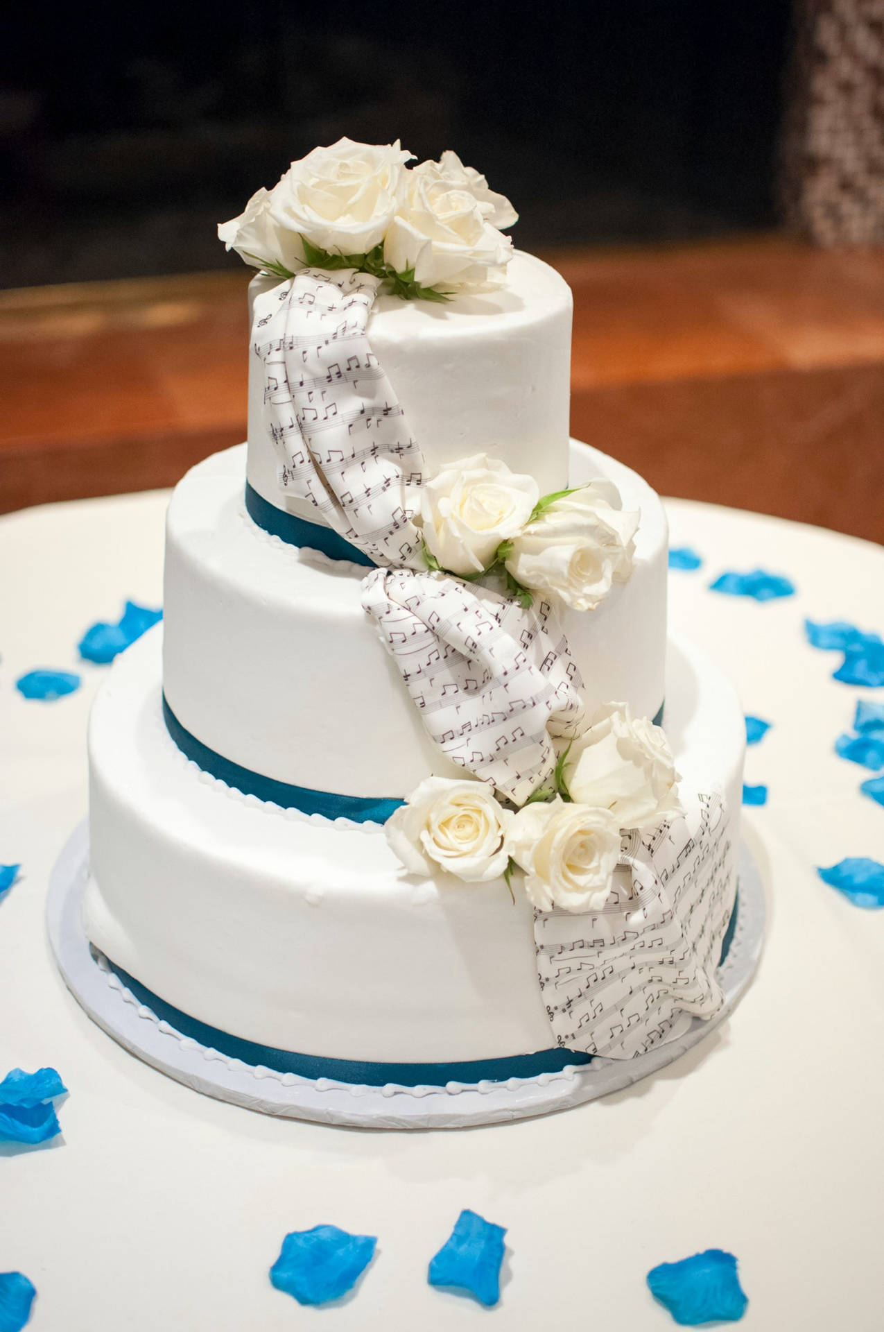 Elegant Tiered White Rose Wedding Cake