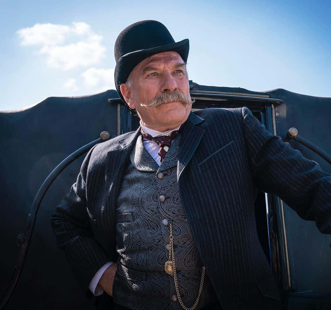 Elegant Vintage Gentleman Outdoors Background