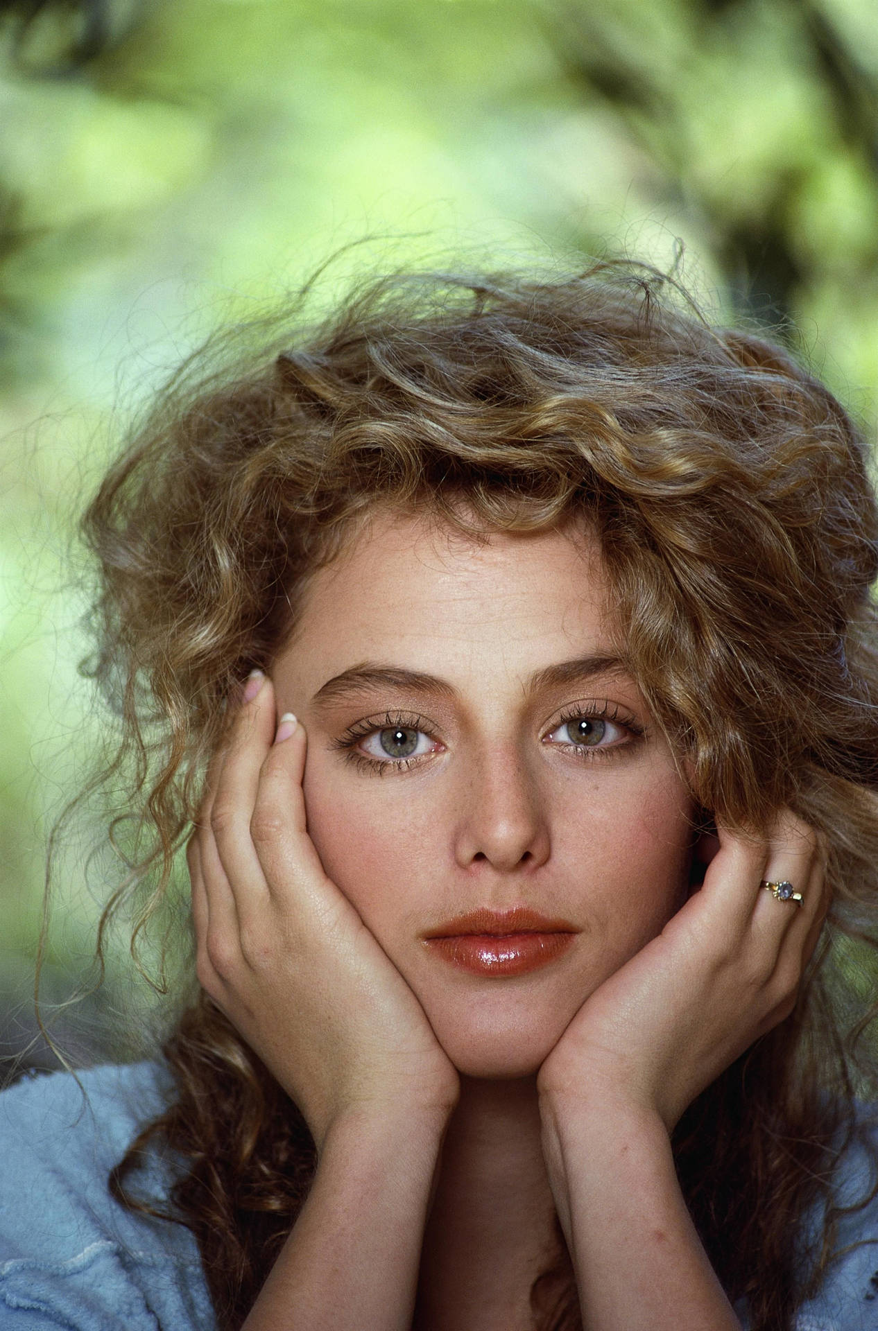 Elegant Virginia Madsen Posing For The Camera Background