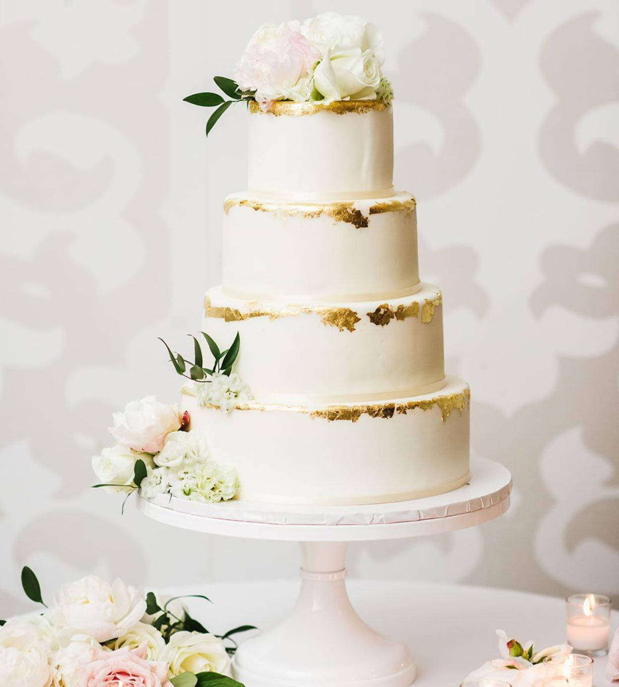 Elegant White And Gold Trimmed Wedding Cake