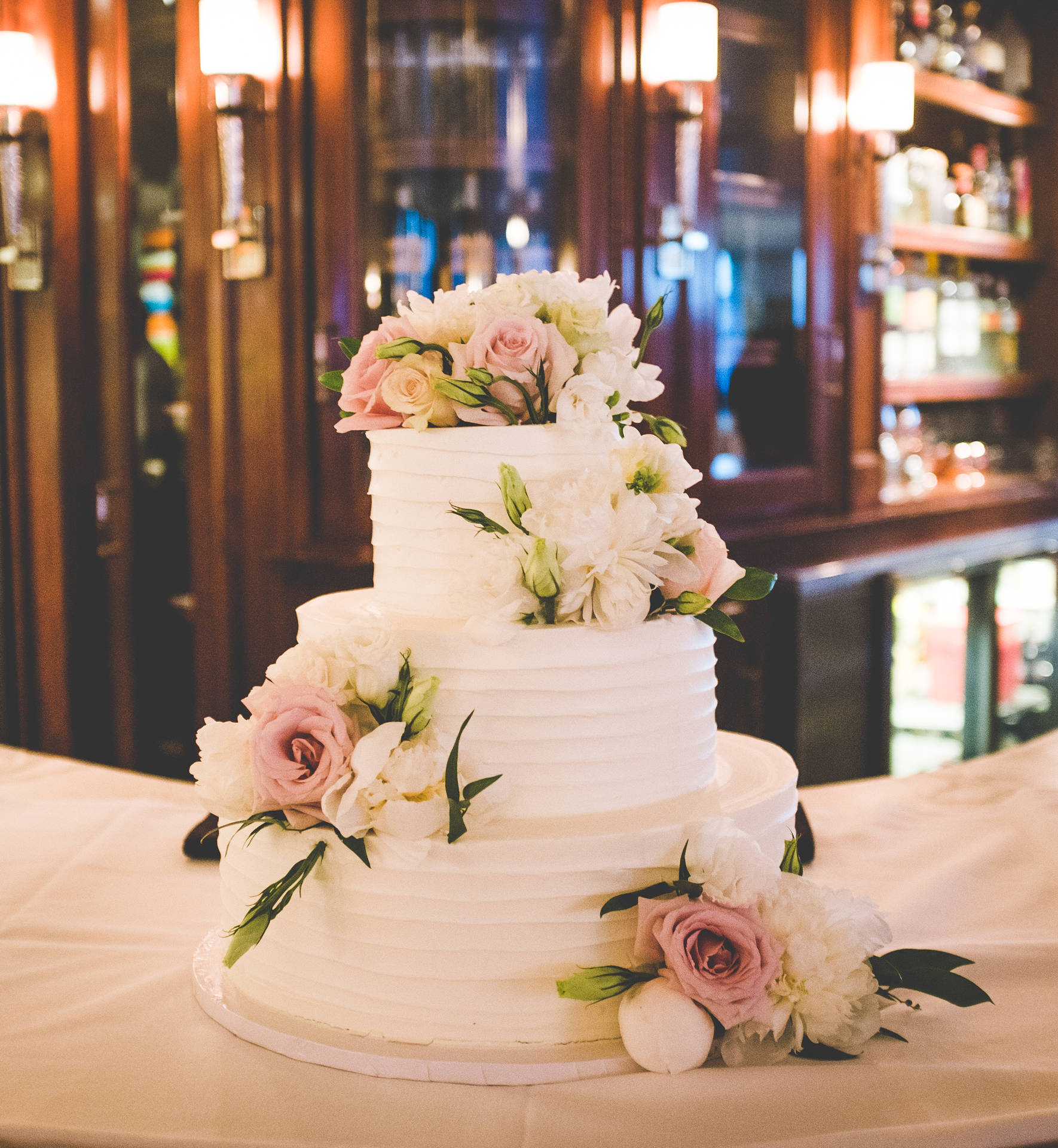 Elegant White Floral Detail Wedding Cake