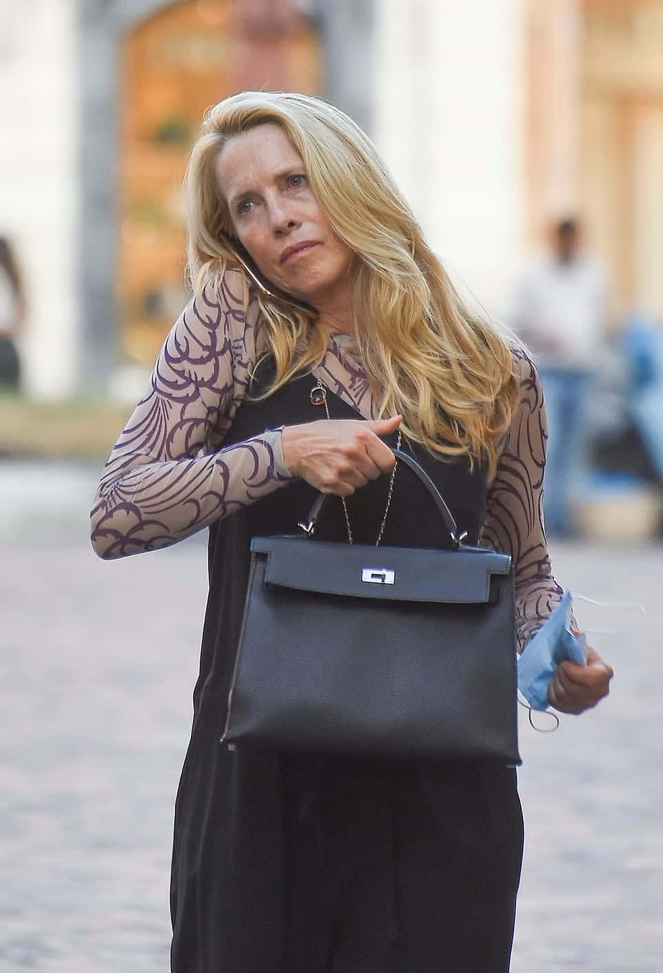 Elegant Woman Carrying Black Bag Background