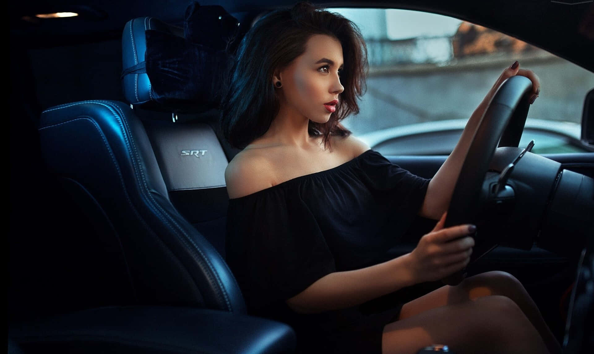 Elegant Woman Driving Car Night