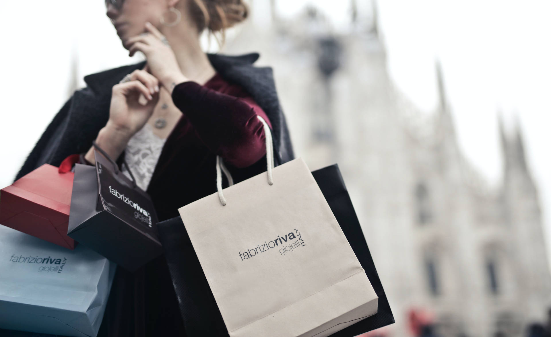 Elegant Woman Making A Luxury Purchase Background