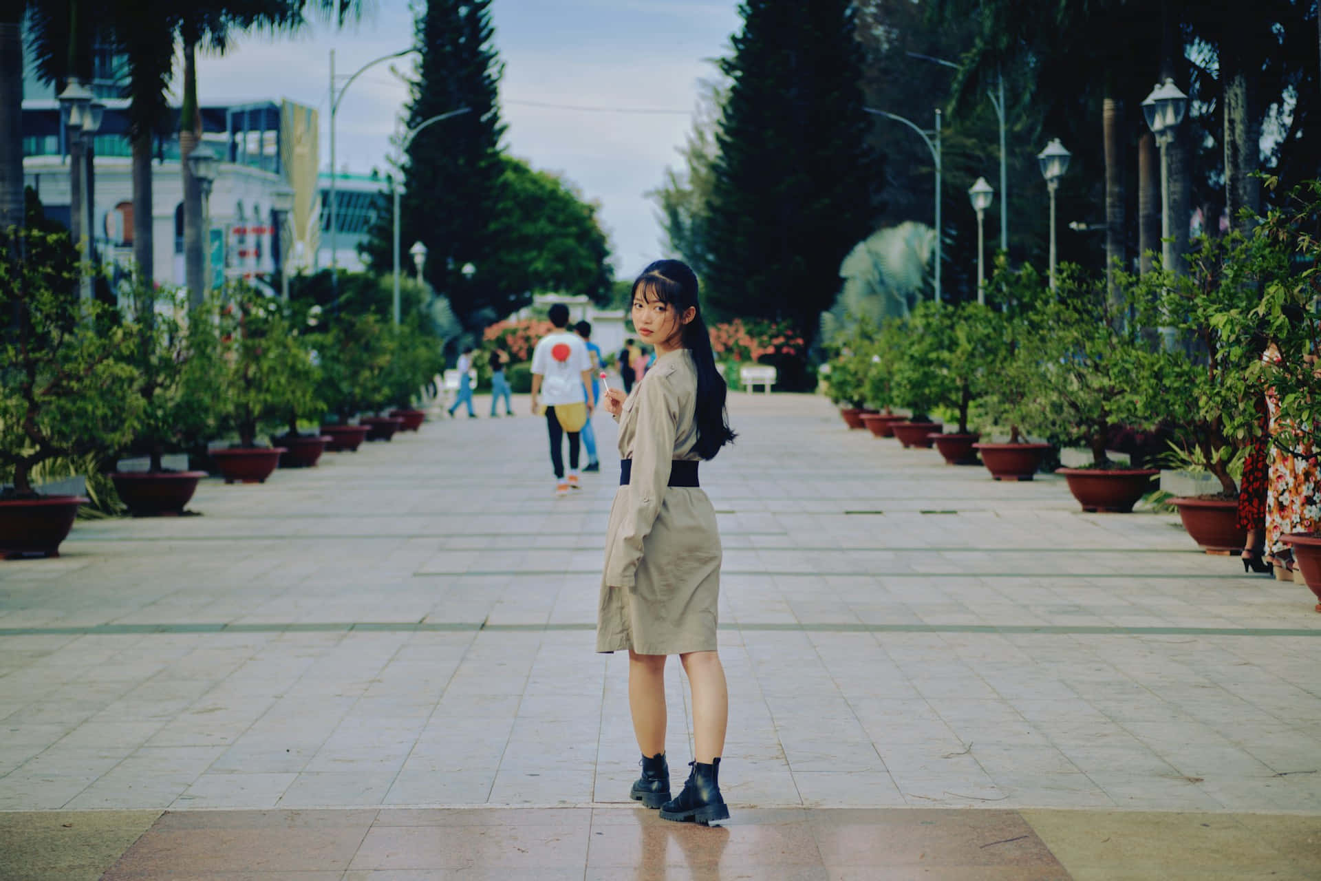 Elegant Woman Park Promenade Background