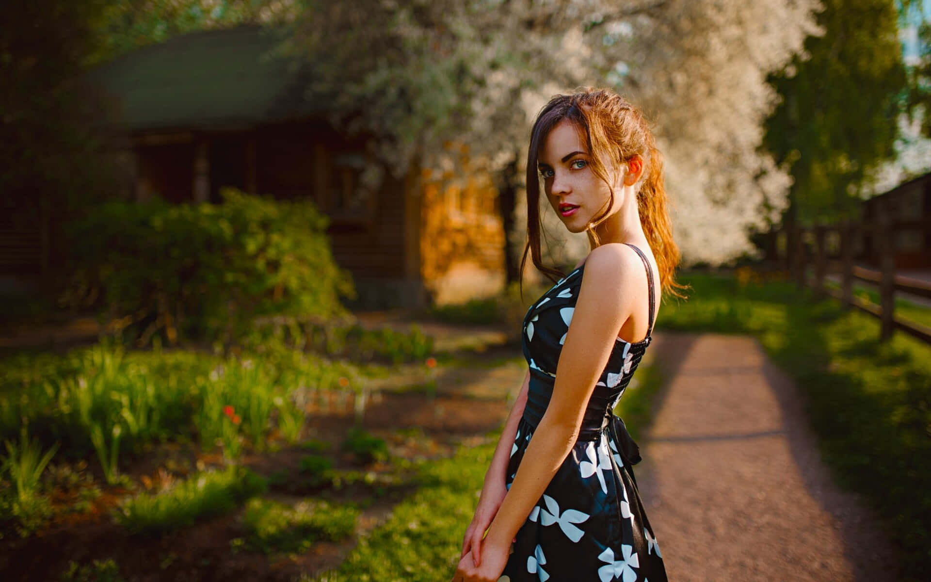 Elegant Woman Springtime Garden Background