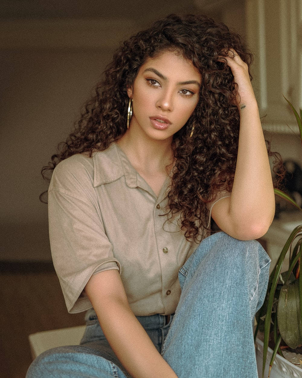 Elegant Woman With Curly Hair Background