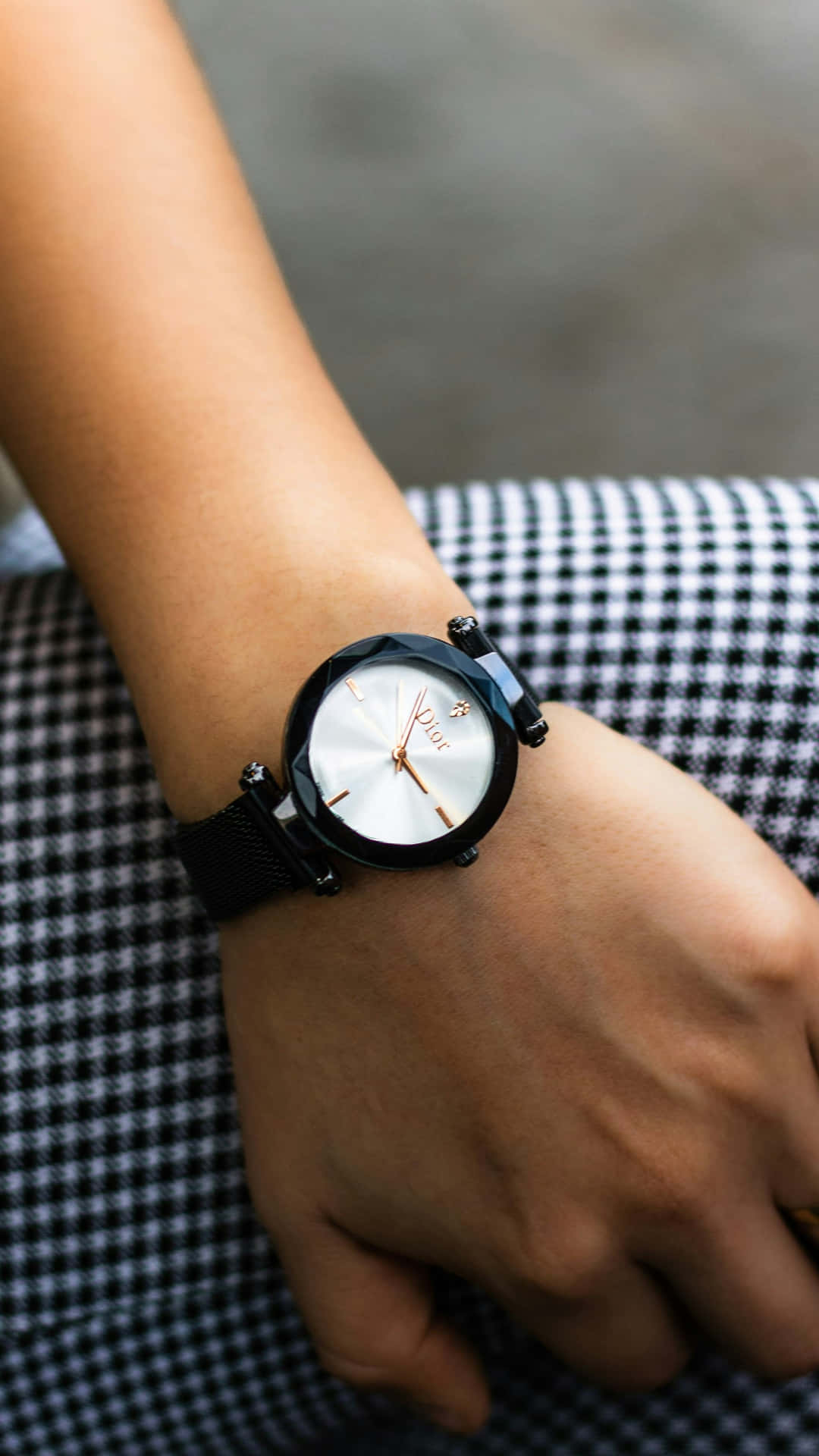 Elegant Wristwatchon Arm Background