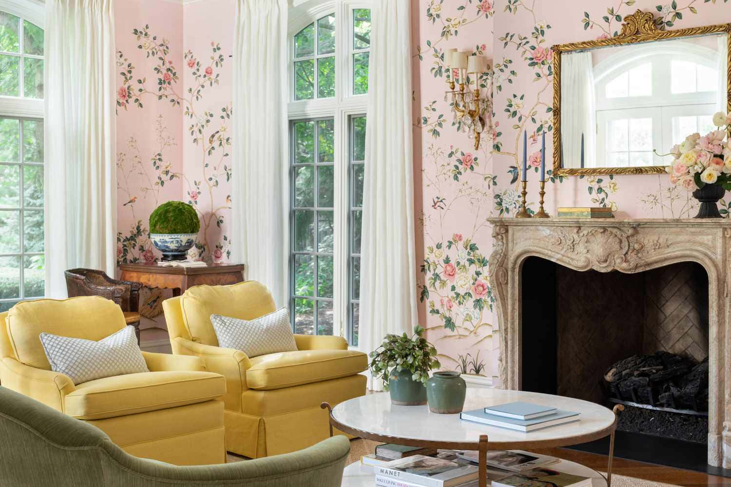 Elegant Yellow Couch Against A Floral Accent Wall Background