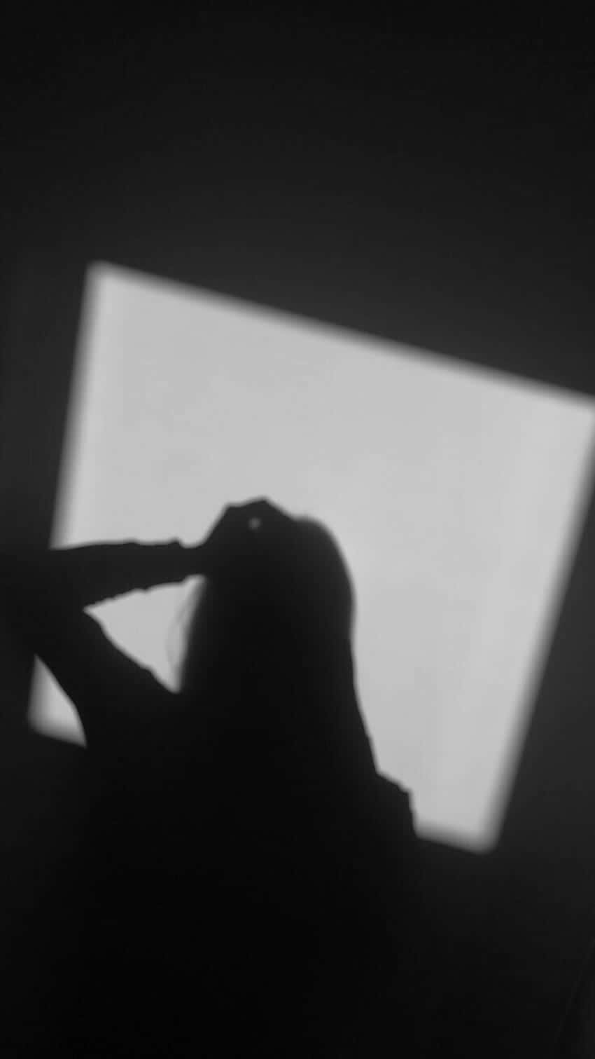 Elegantly Mysterious: Girl Shadow Pfp Background