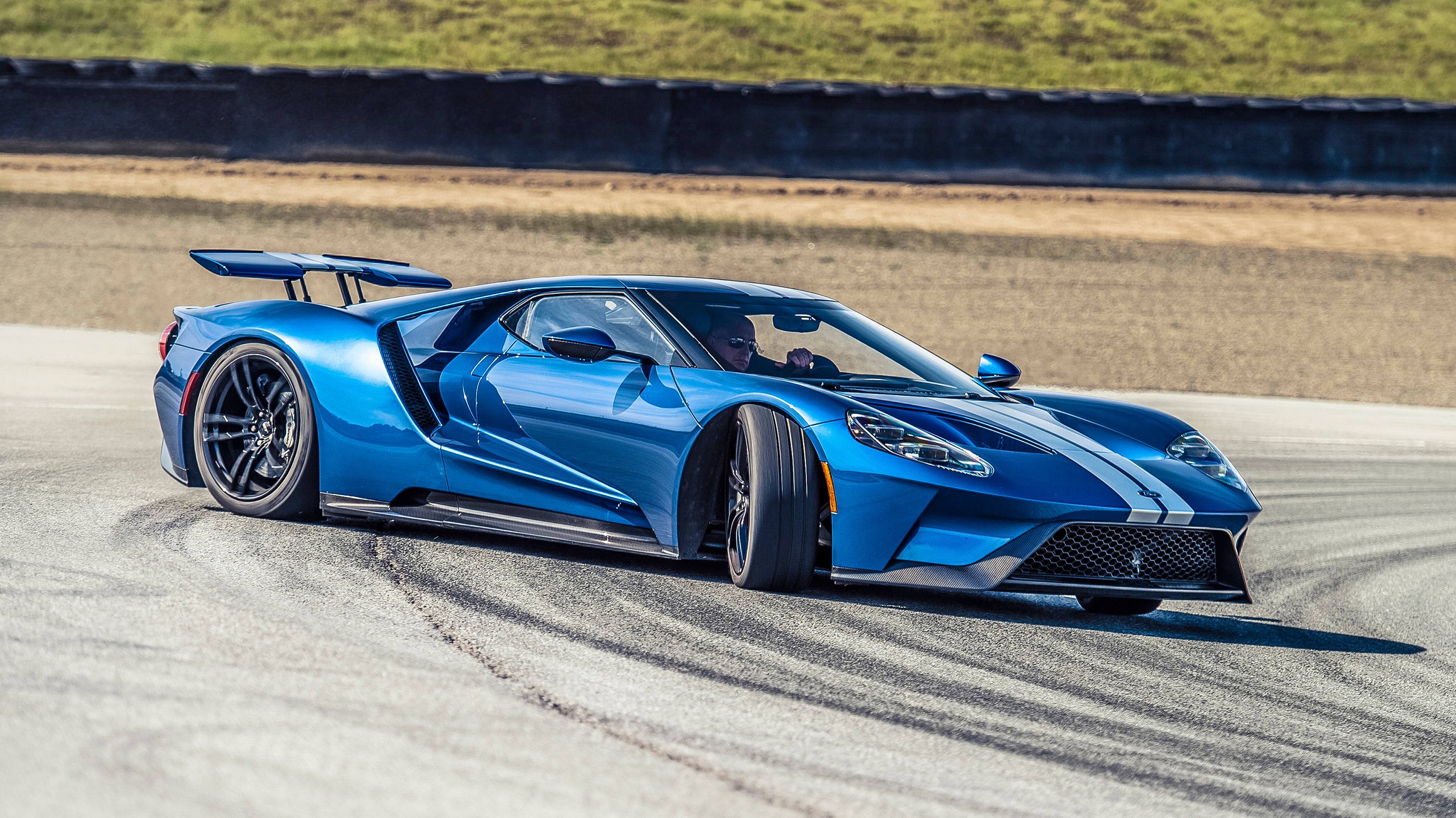 Elegantly Powerful - The Cobalt Blue Ford Gt. Background