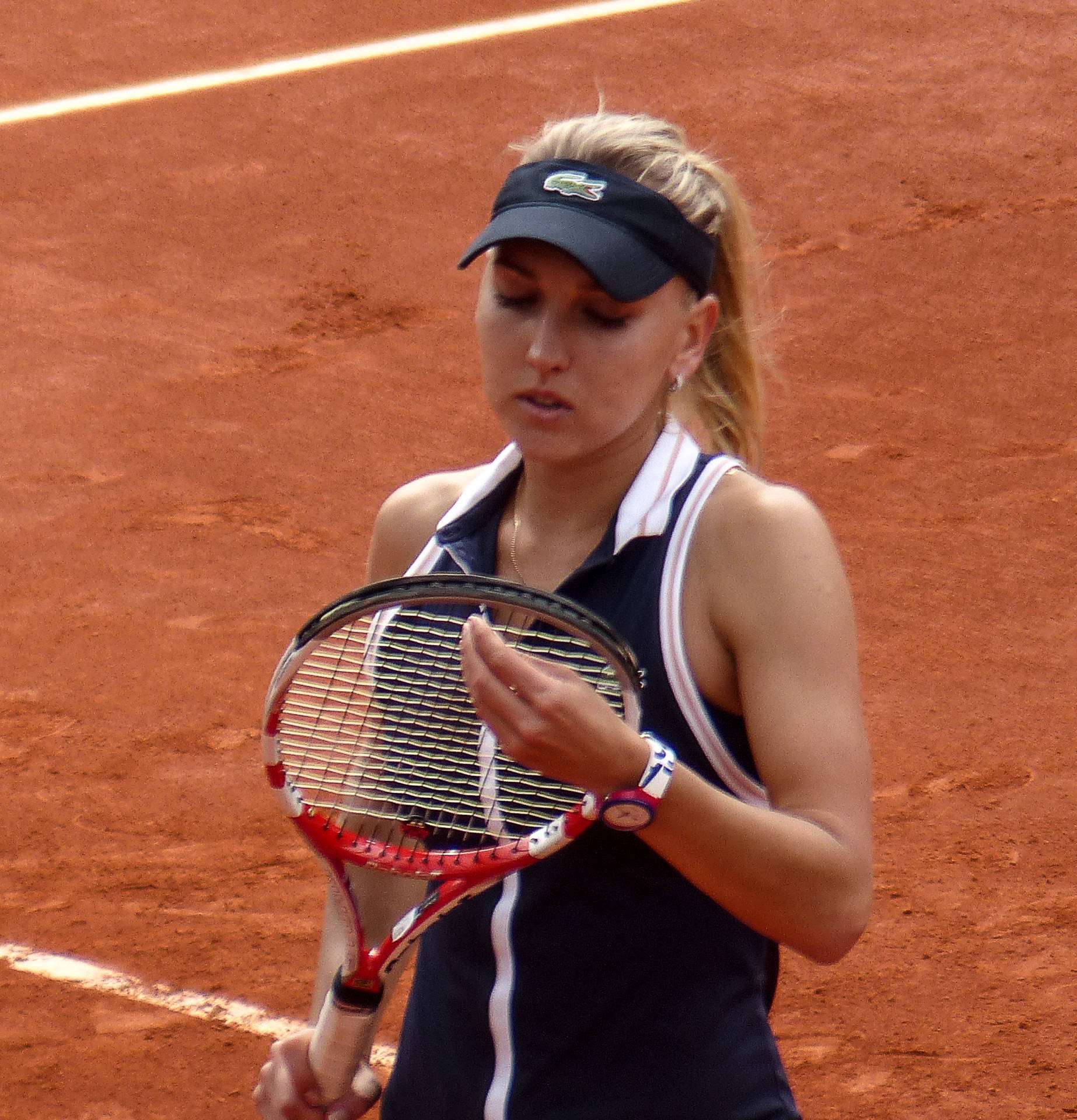 Elena Vesnina Fixing Racket Background