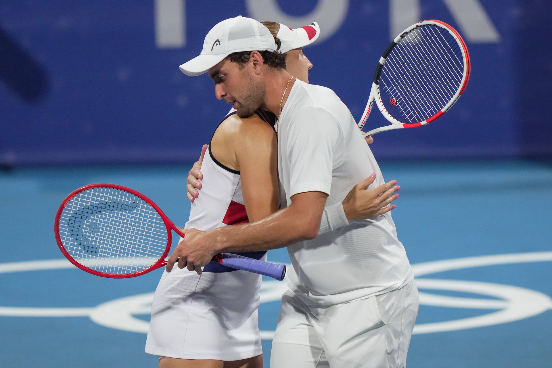 Elena Vesnina Hugging Aslan Karatsev Background