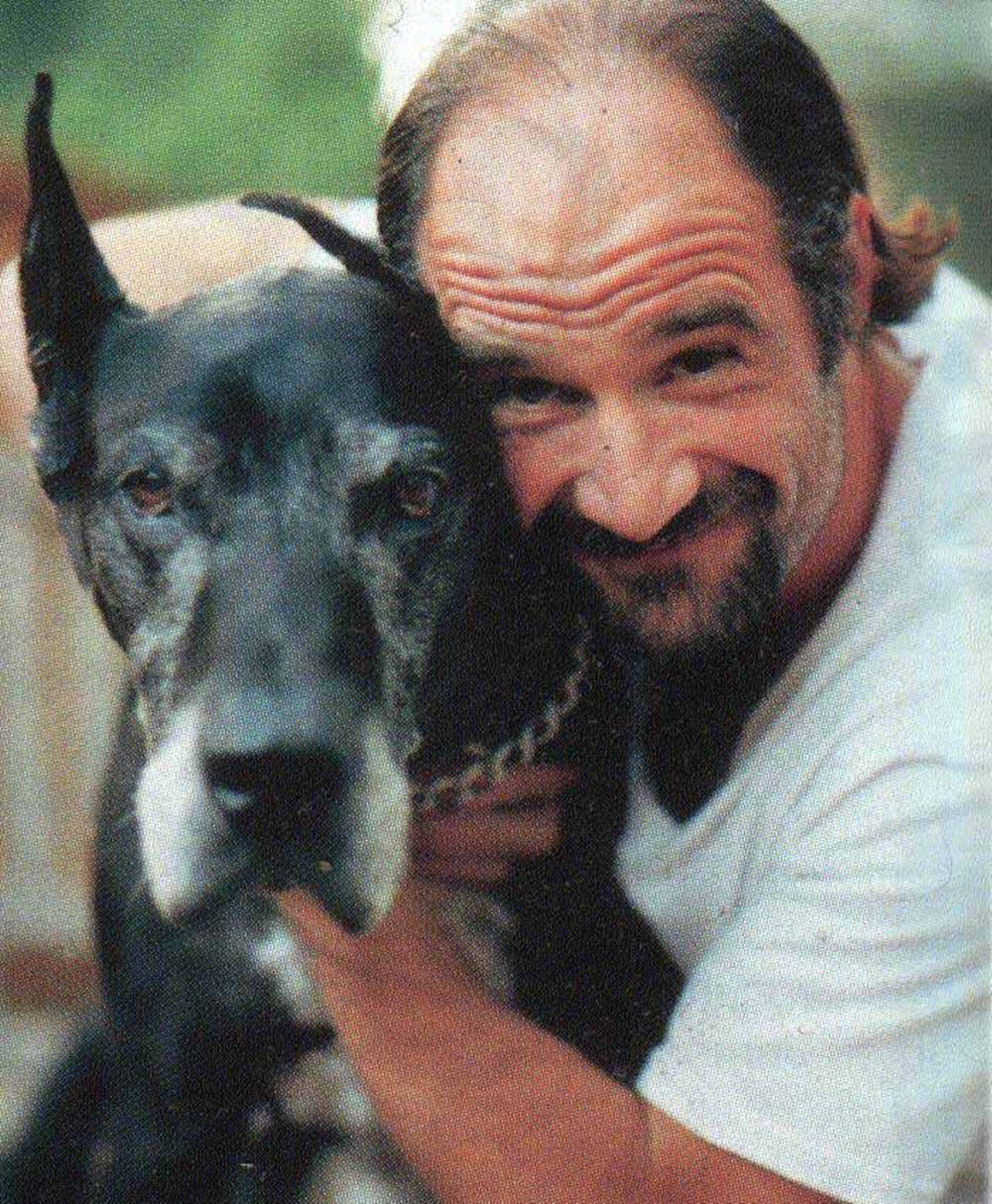 Elias Koteas Hugging A Dog