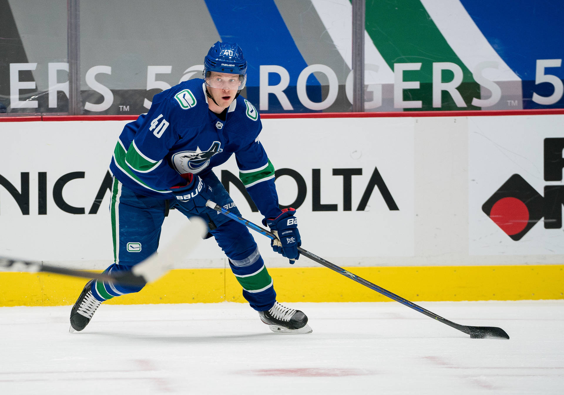 Elias Pettersson Plays Against Calgary Flames Background