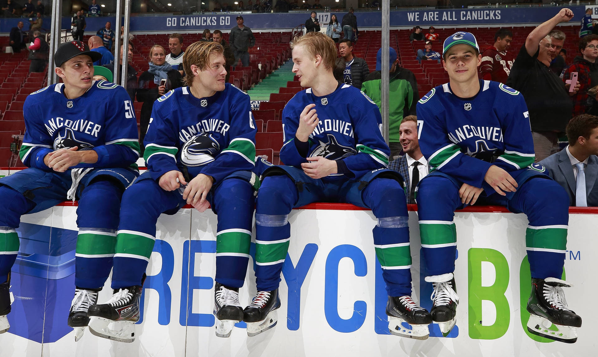 Elias Pettersson With Canucks Teammates Background
