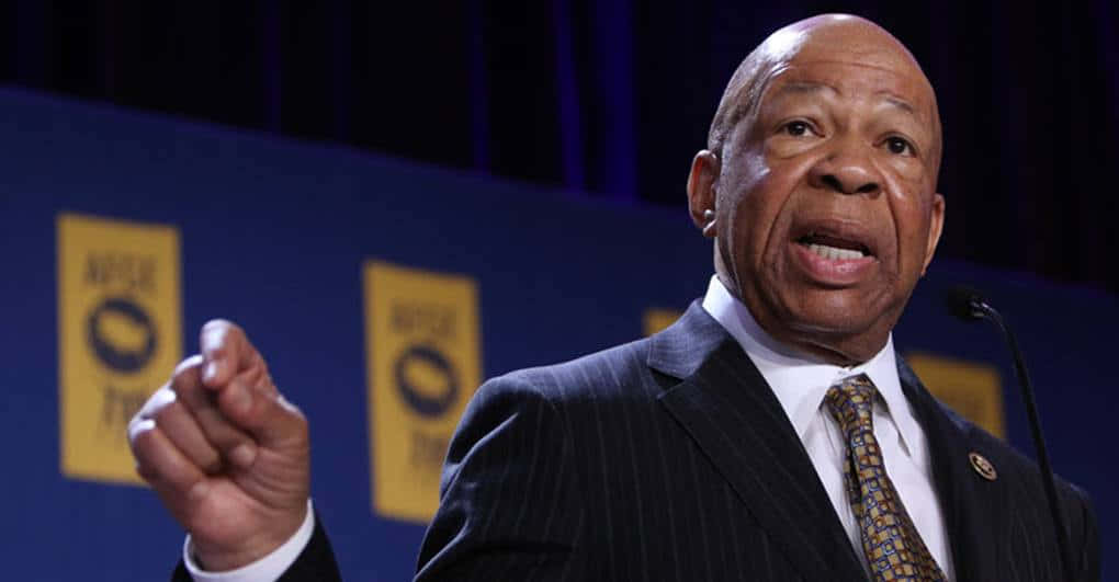 Elijah Cummings Speaking In Front Of Blue Backdrop Background