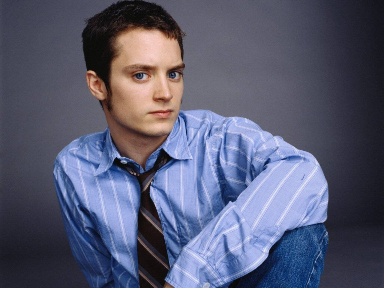 Elijah Wood In Blue Background