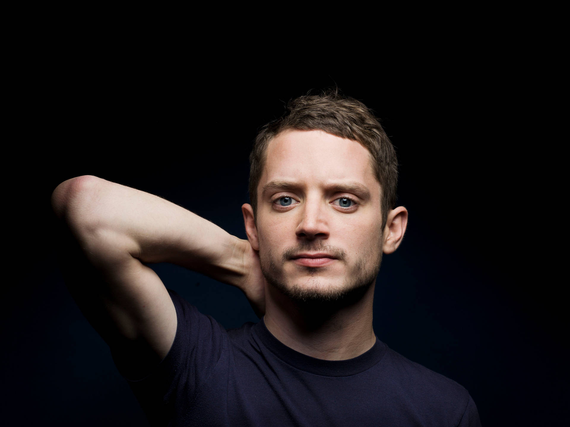 Elijah Wood On Black Background Background