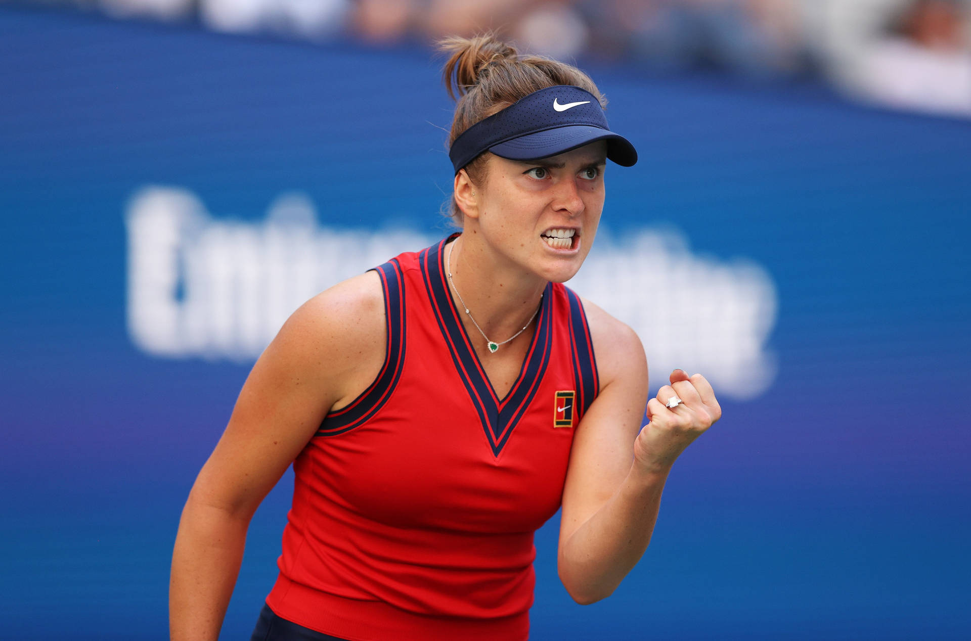 Elina Svitolina Clenching Her Fist Background