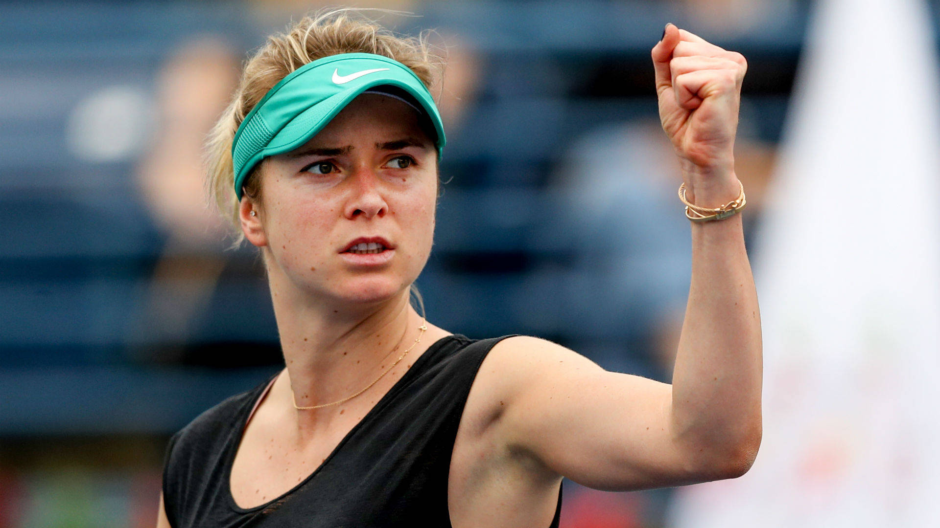 Elina Svitolina Wearing Green Sun Visor Background