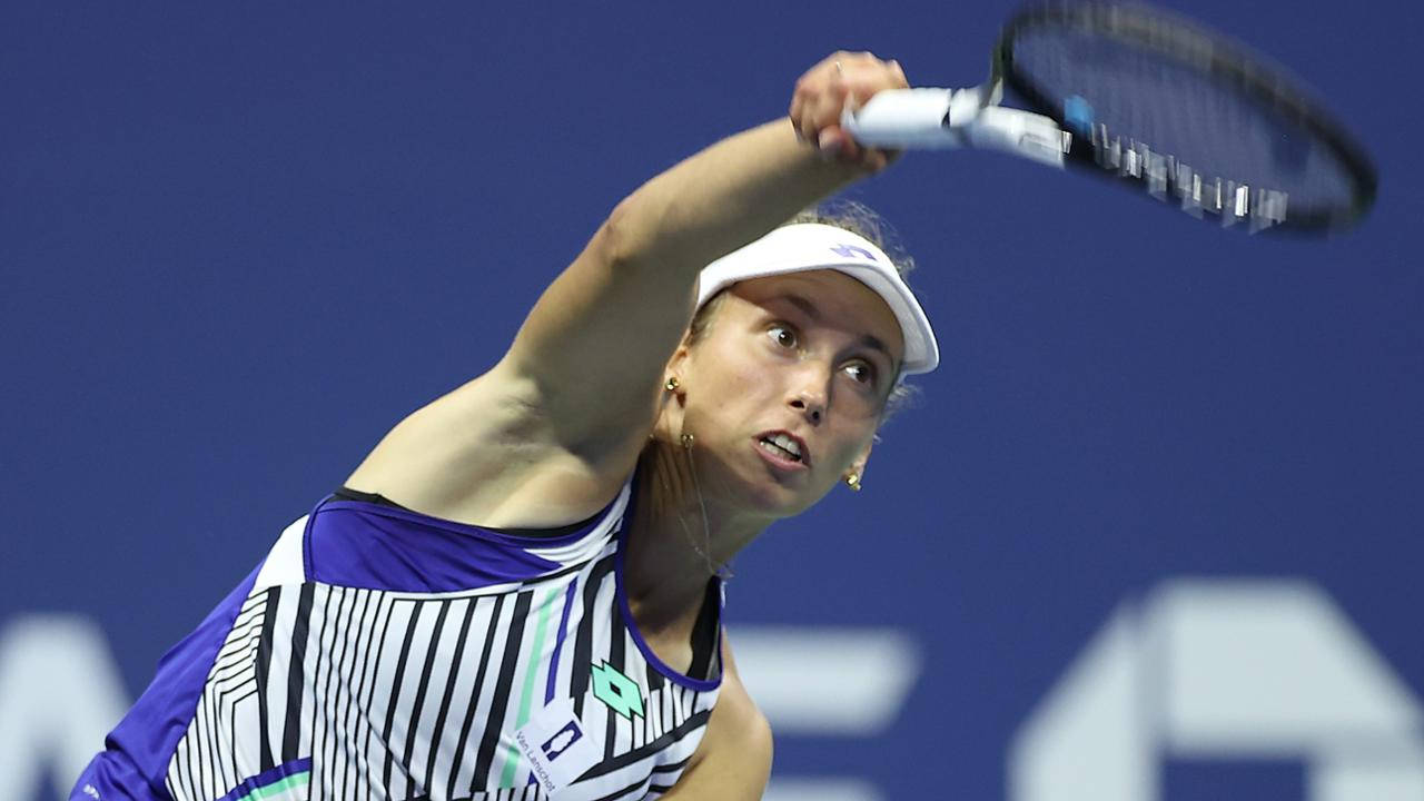 Elise Mertens Delivering A Tennis Stroke Background