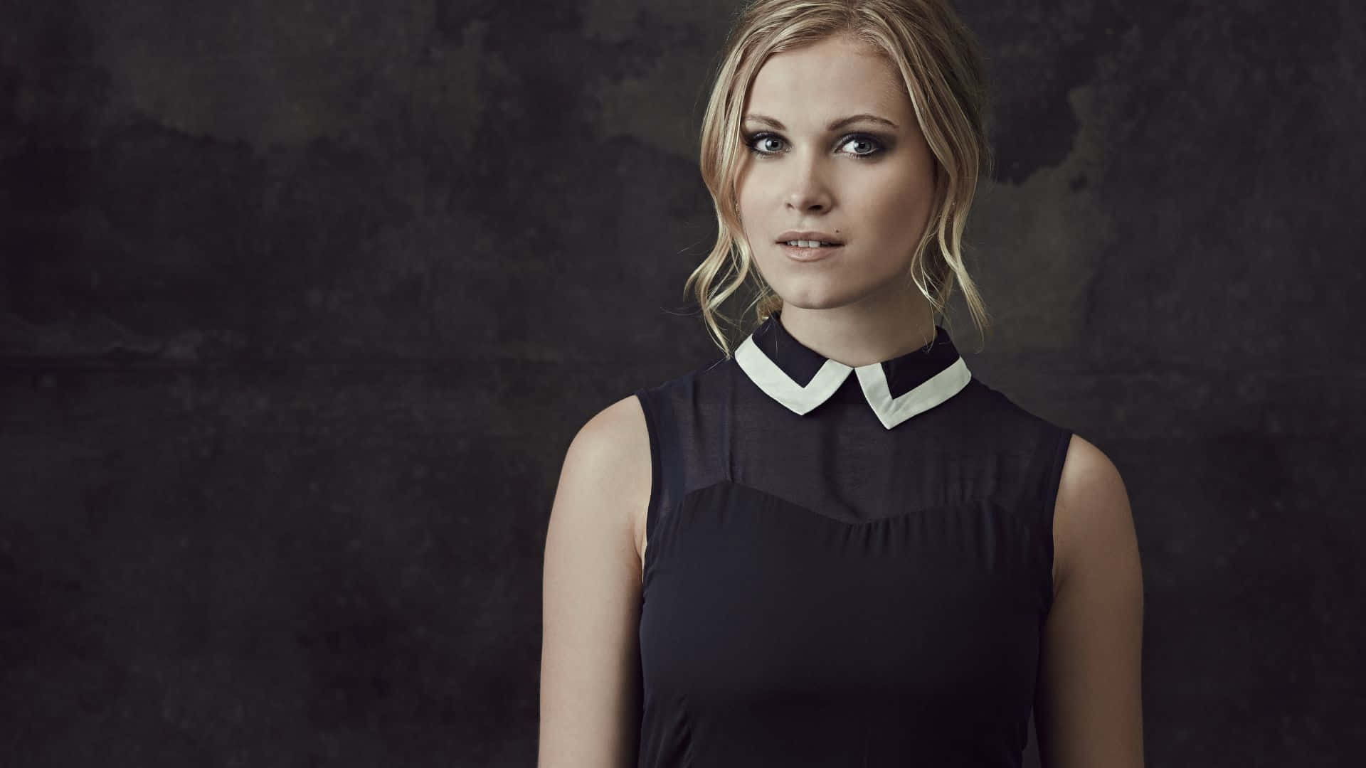 Eliza Taylor At A Celebrity Event Background