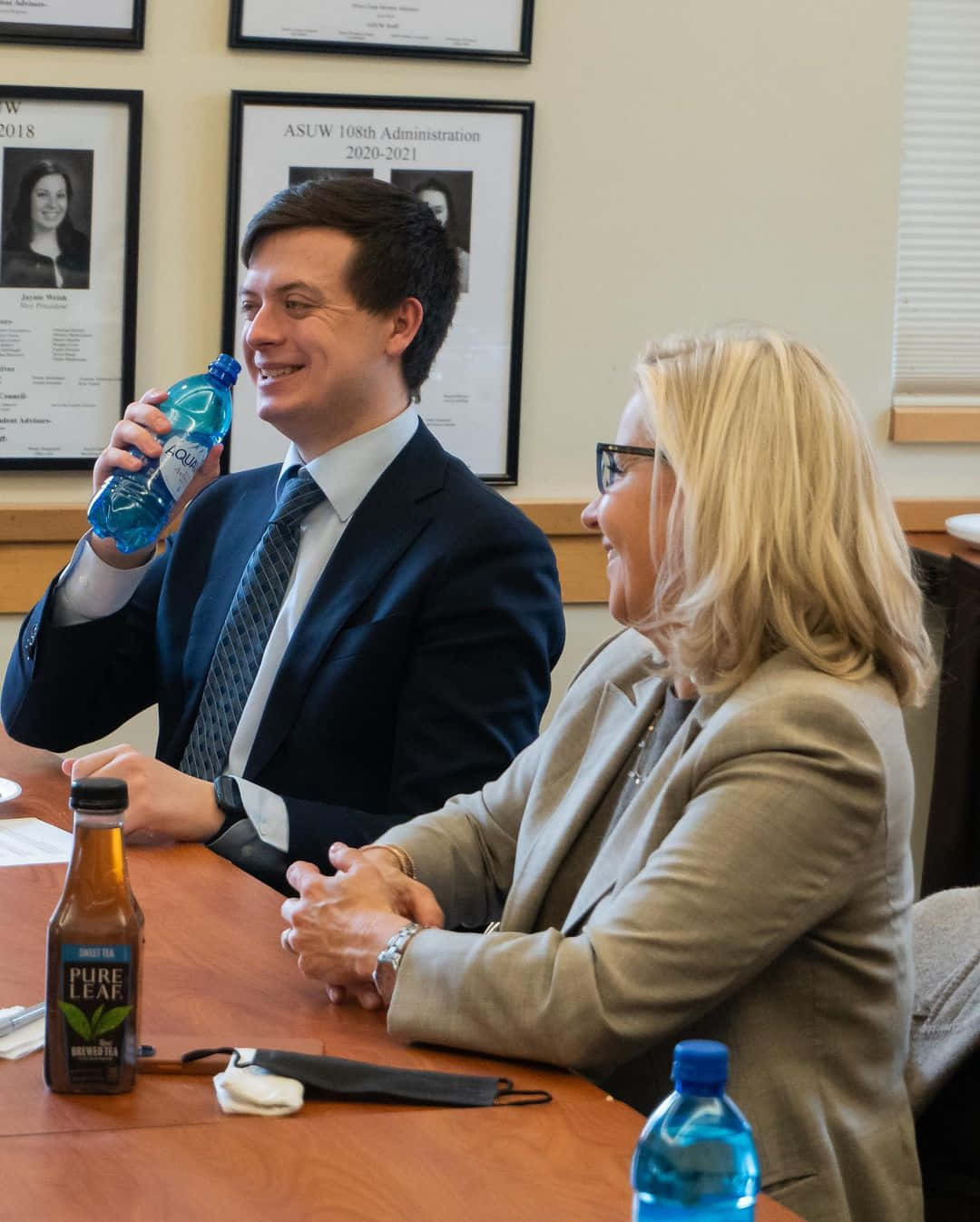 Elizabeth Cheney Smiling During Meeting Background