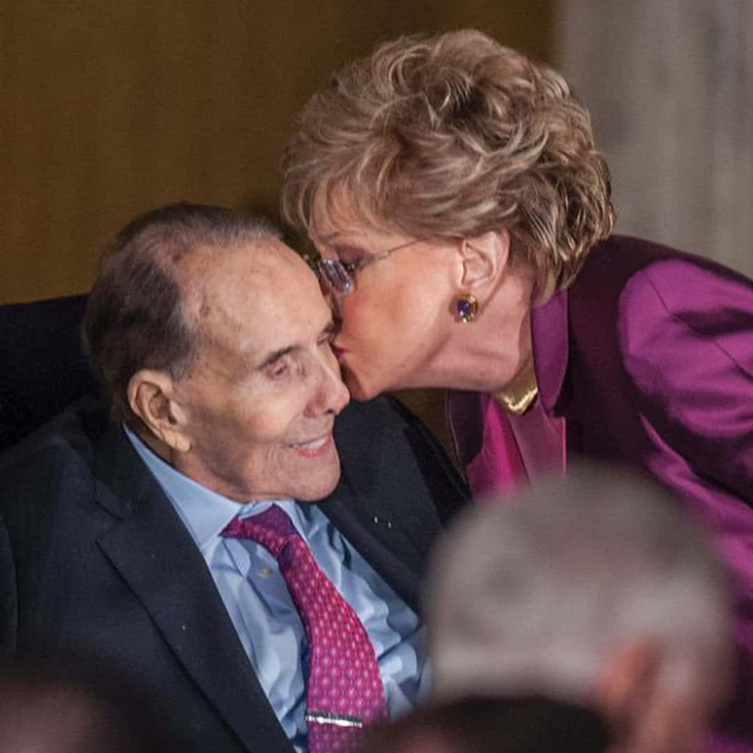 Elizabeth Dole Kissing Bob Background