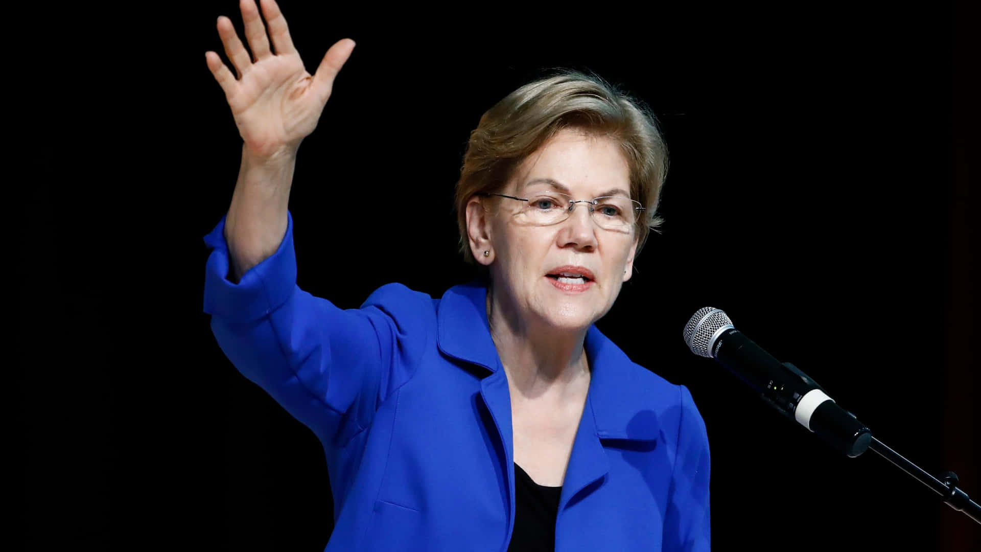 Elizabeth Warren Waving In Blue Coat