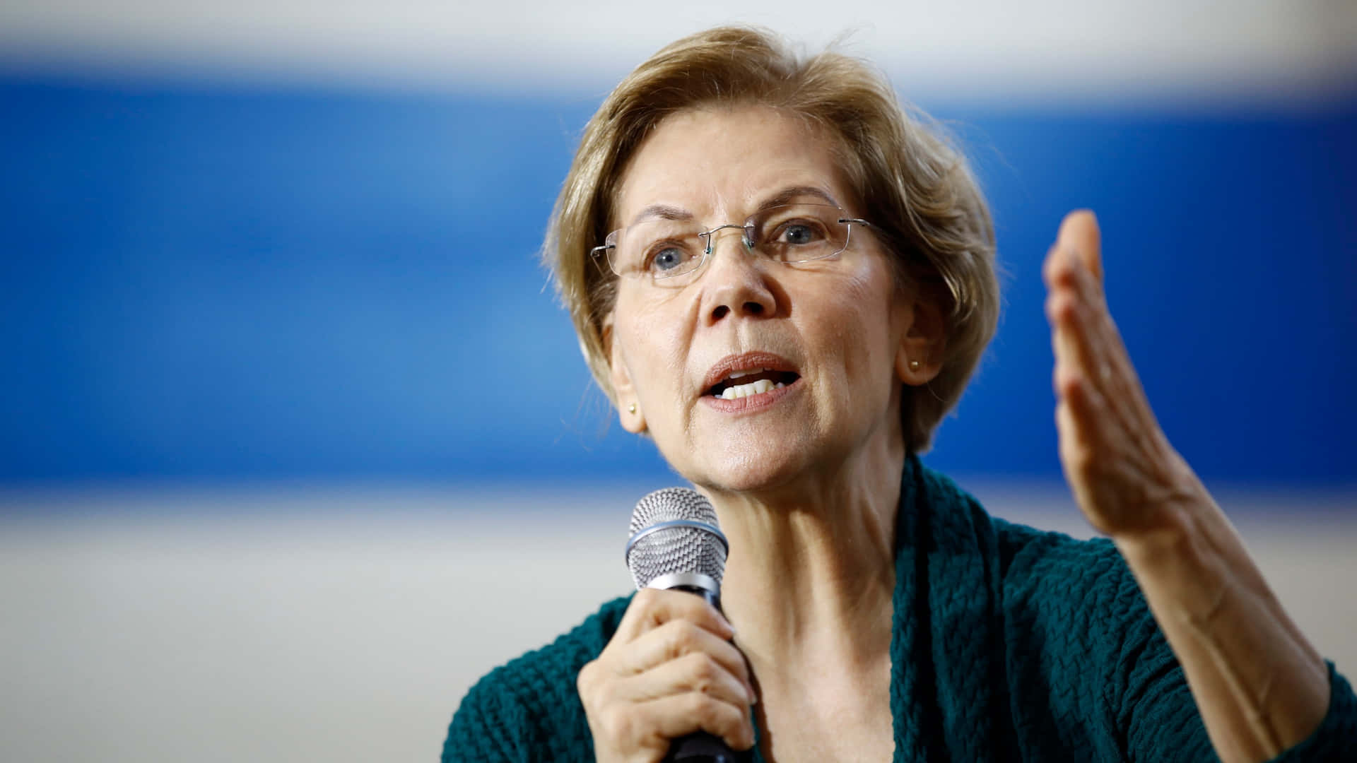 Elizabeth Warren With Open Palm Background