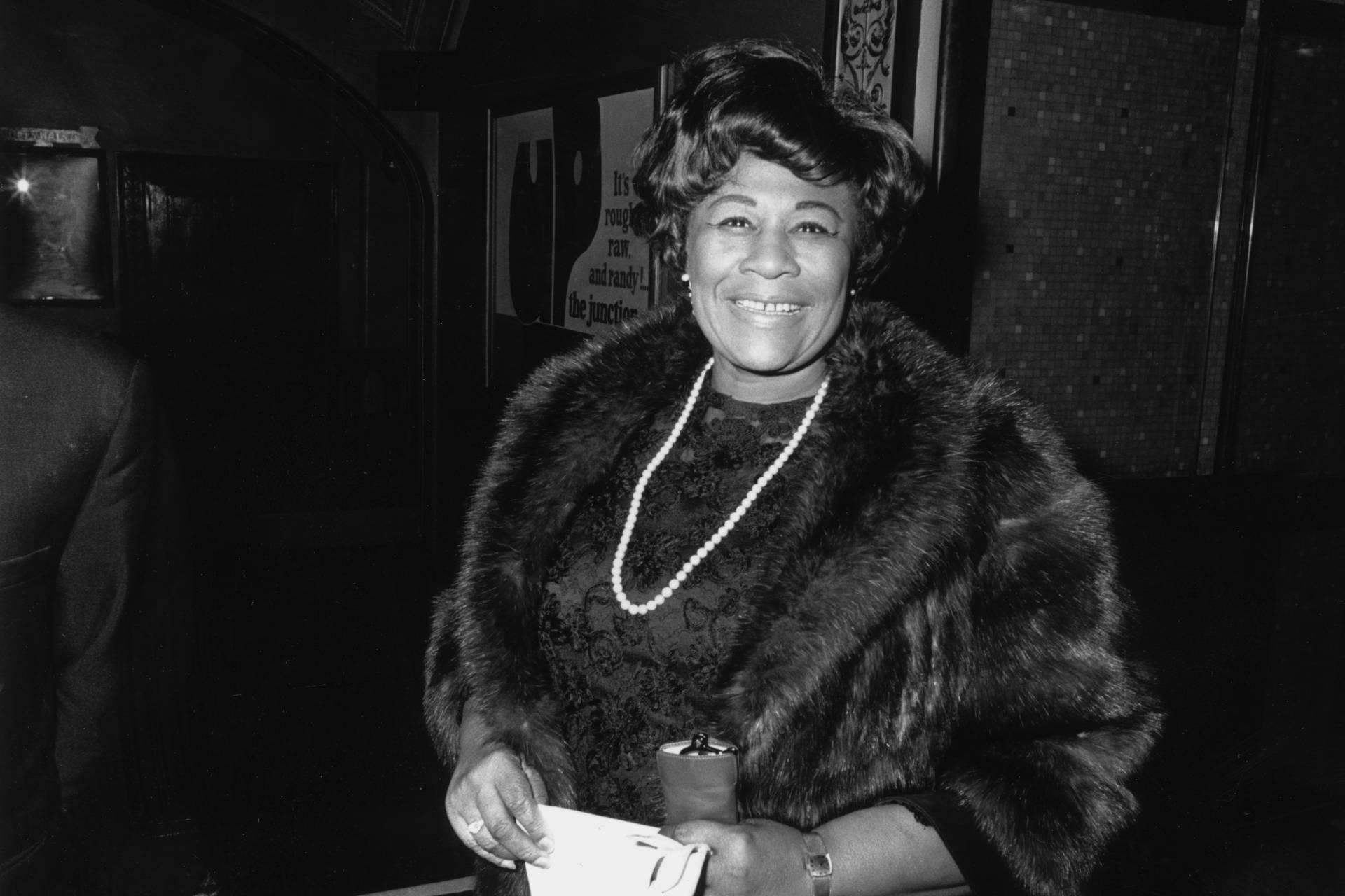 Ella Fitzgerald In Fur Attire Background