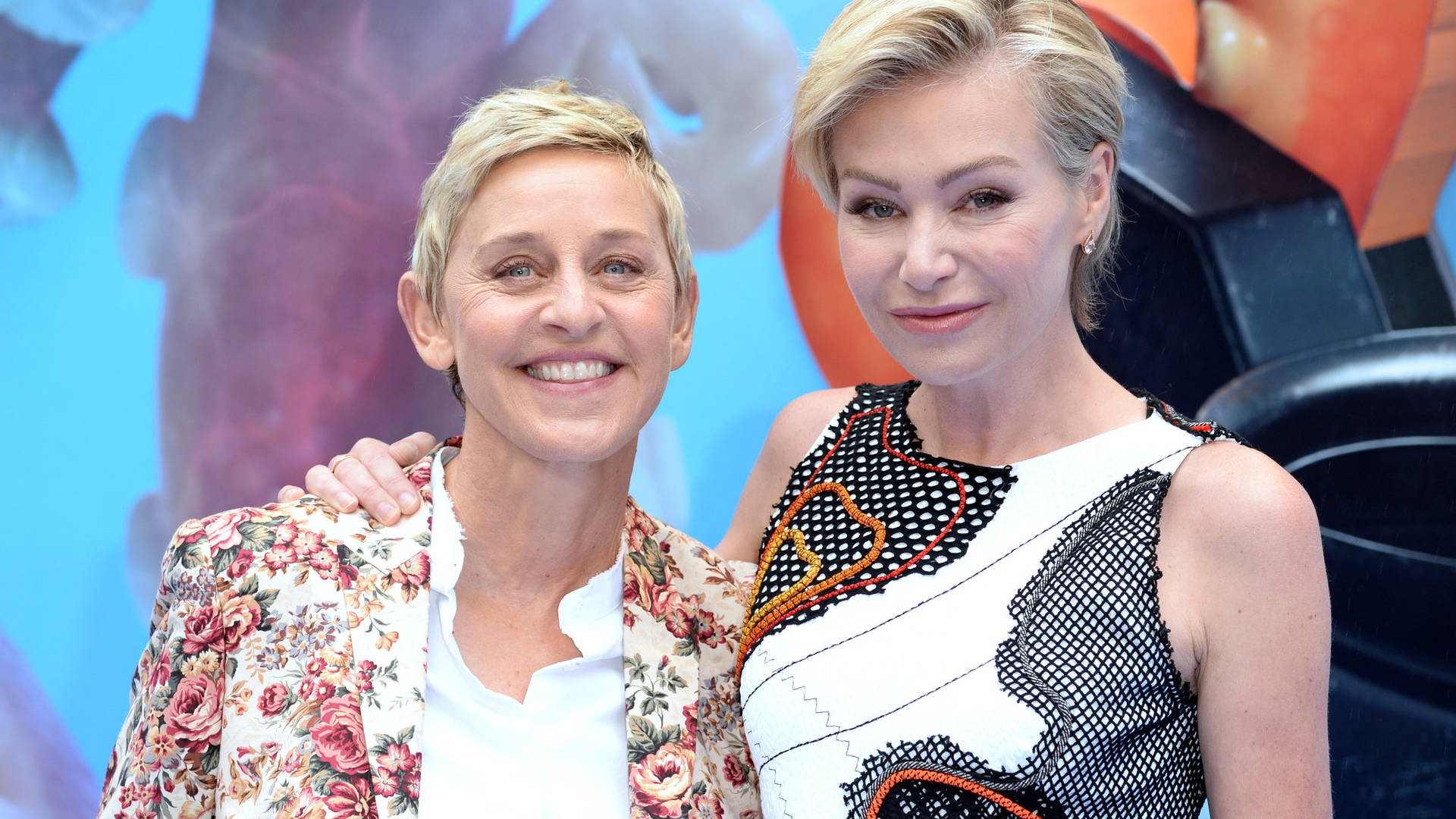Ellen Degeneres Smiling With Portia Background