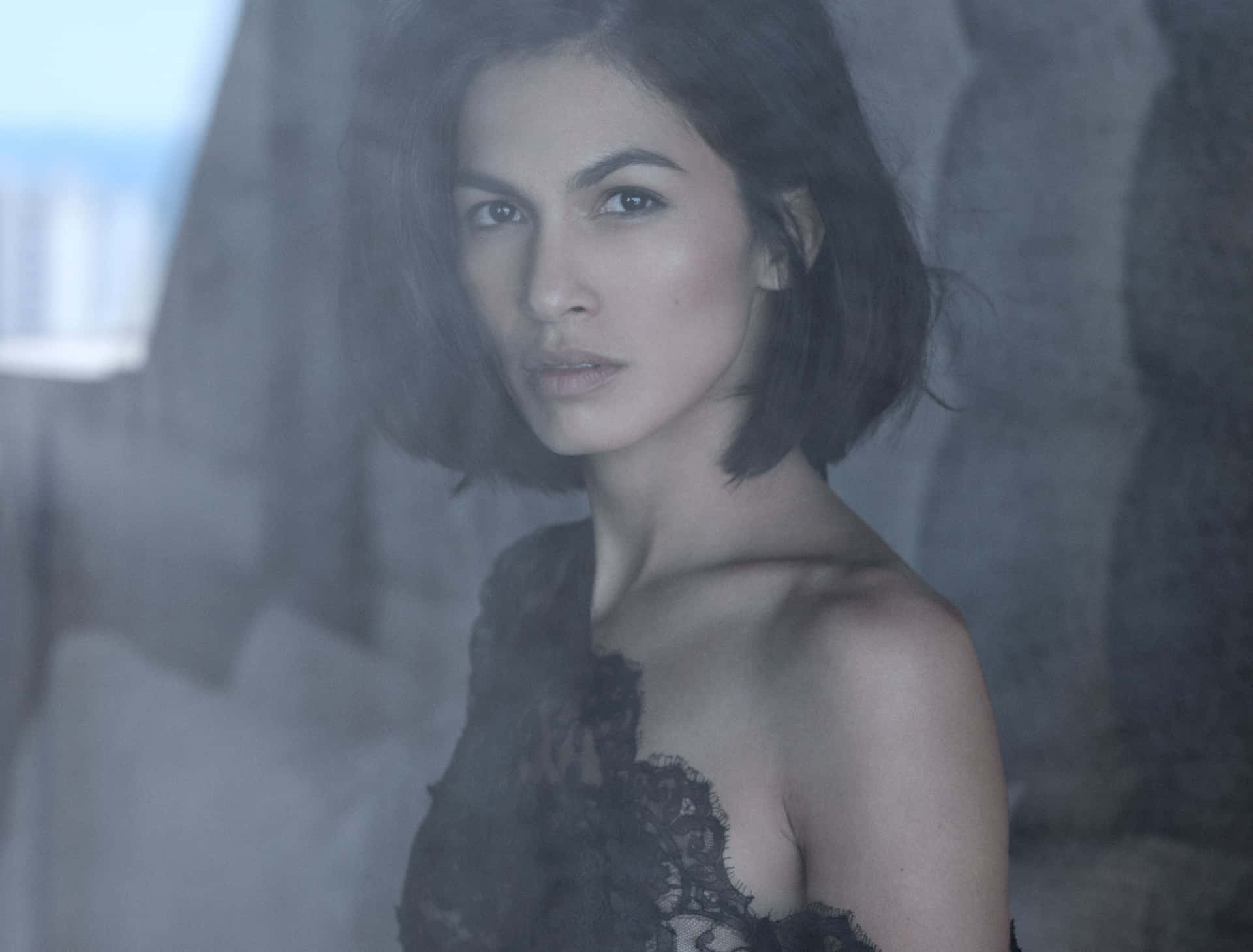 Elodie Yung Behind Glass Background