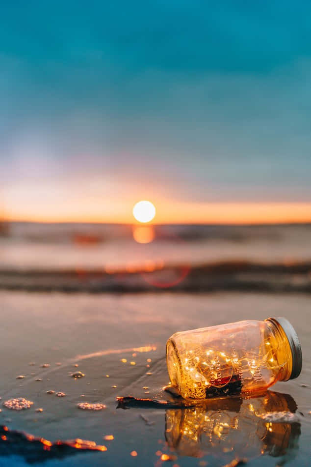 Elusive Fairy Lights On The Beach Background