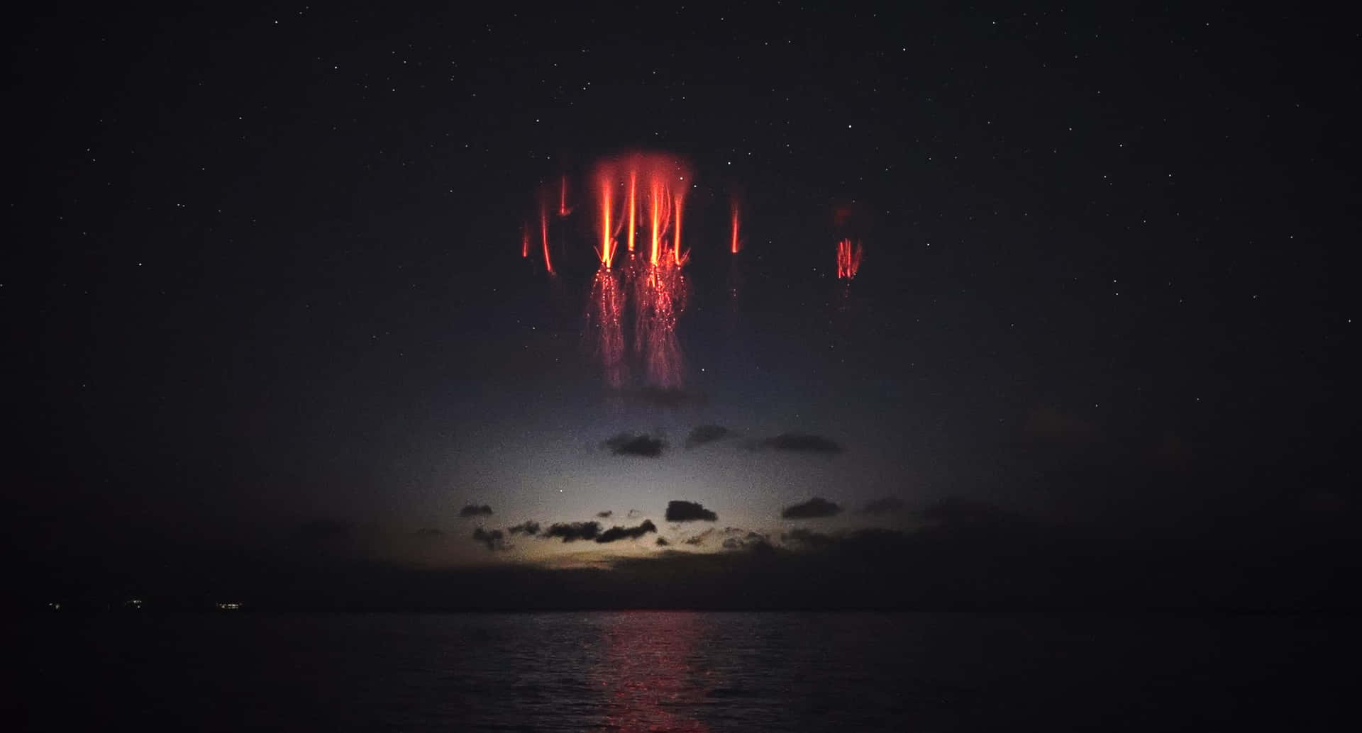 Elusive Red Sprites In Aegean Sea Background