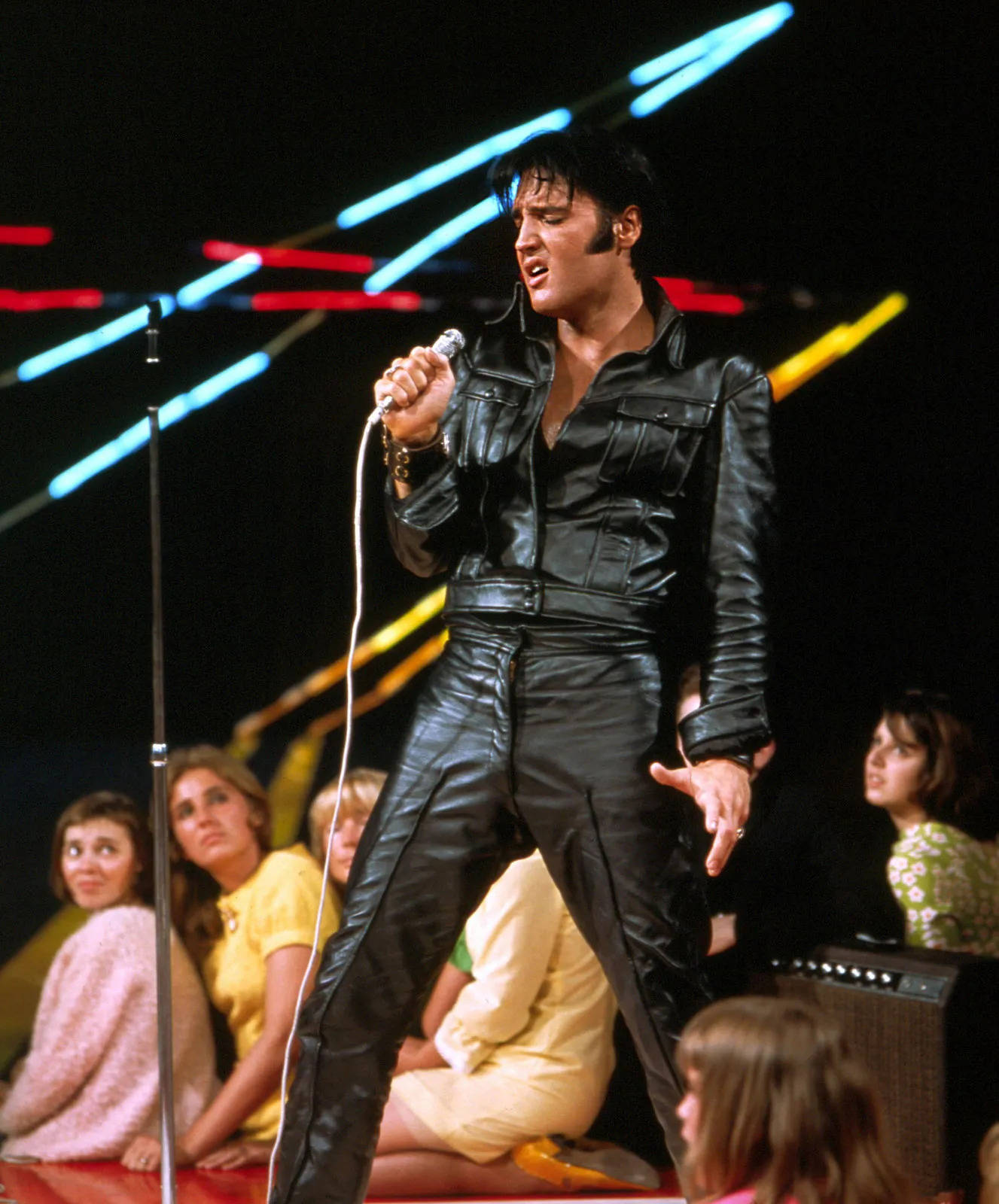 Elvis Presley In Leather Attire Background