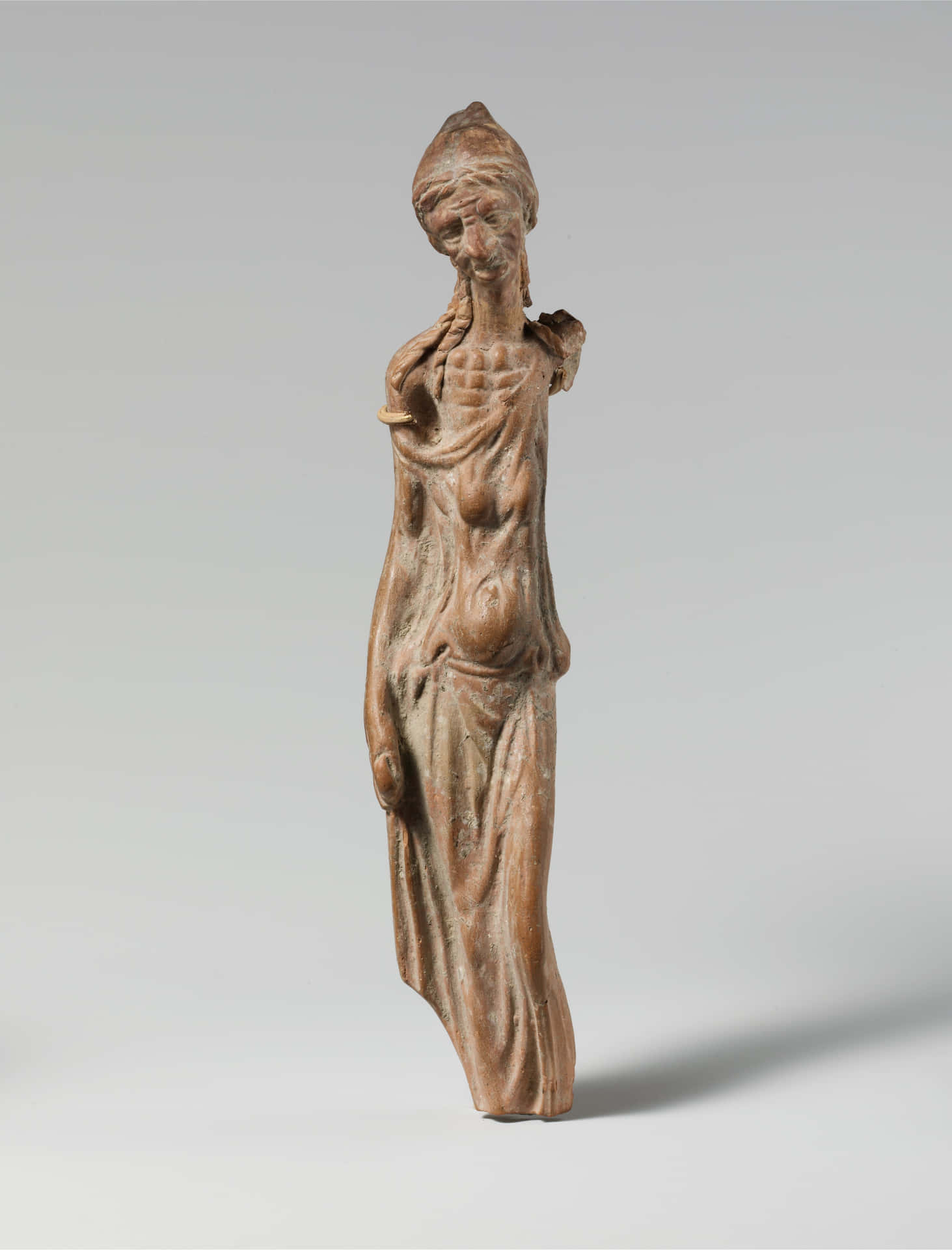 Emaciated Woman Terracotta Statue In A Museum