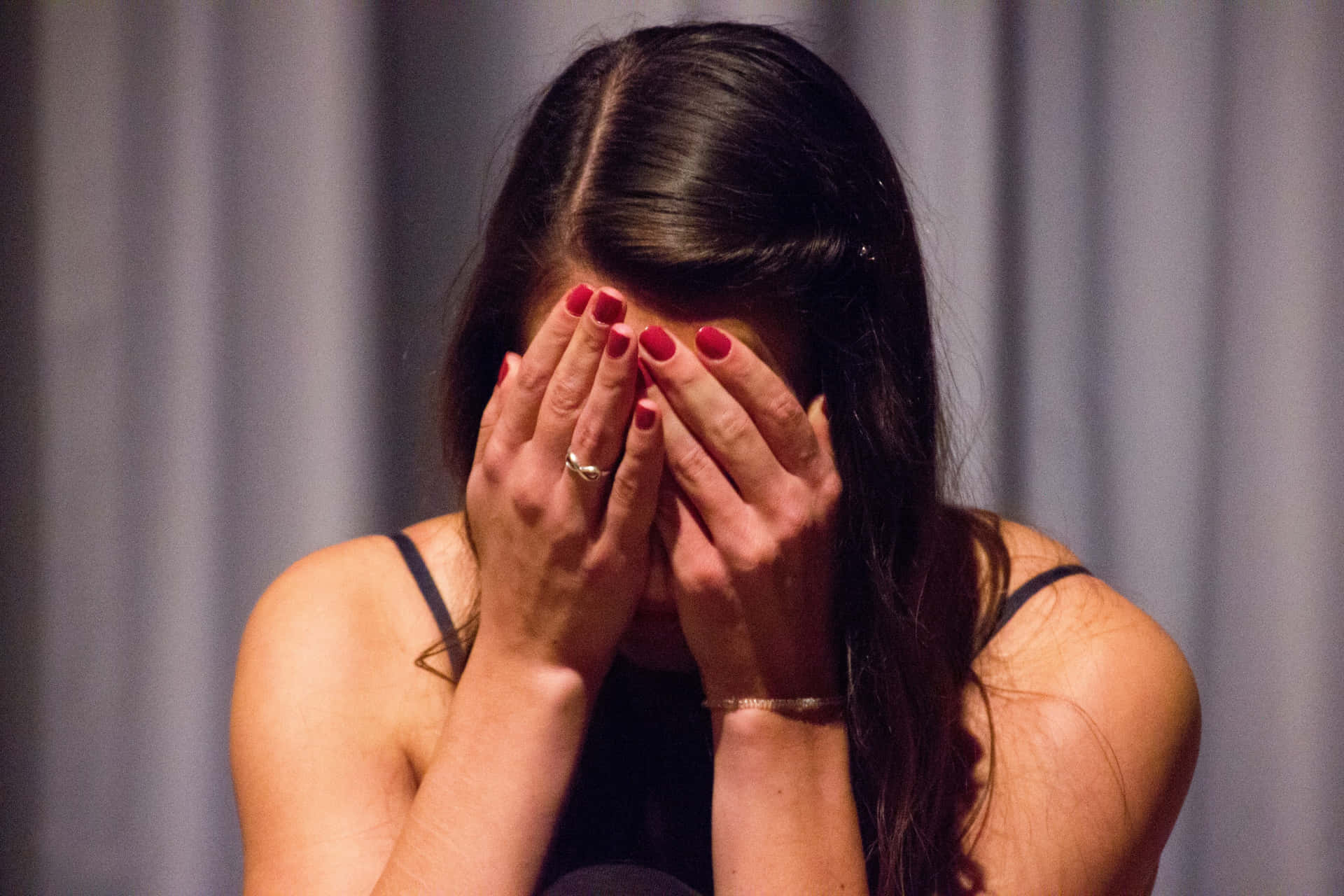 Embarrassed Woman Covering Face Background