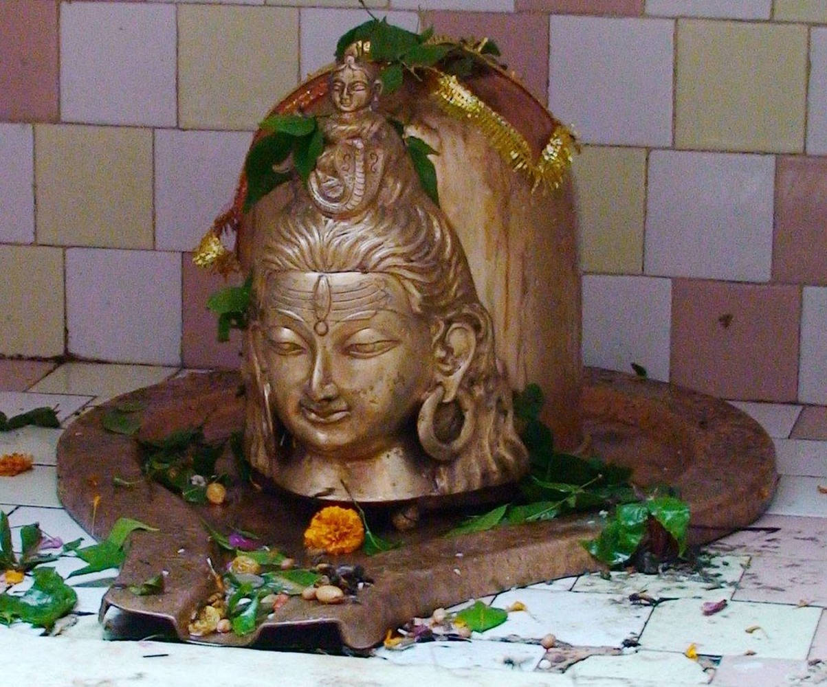 Emblematic Metal Shiva Lingam Background