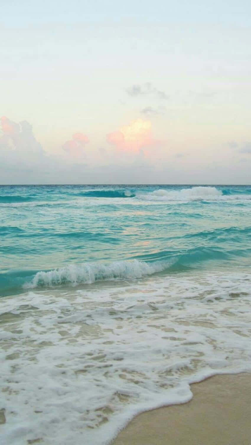 Embrace The Beauty Of A Tranquil Beach Day. Background