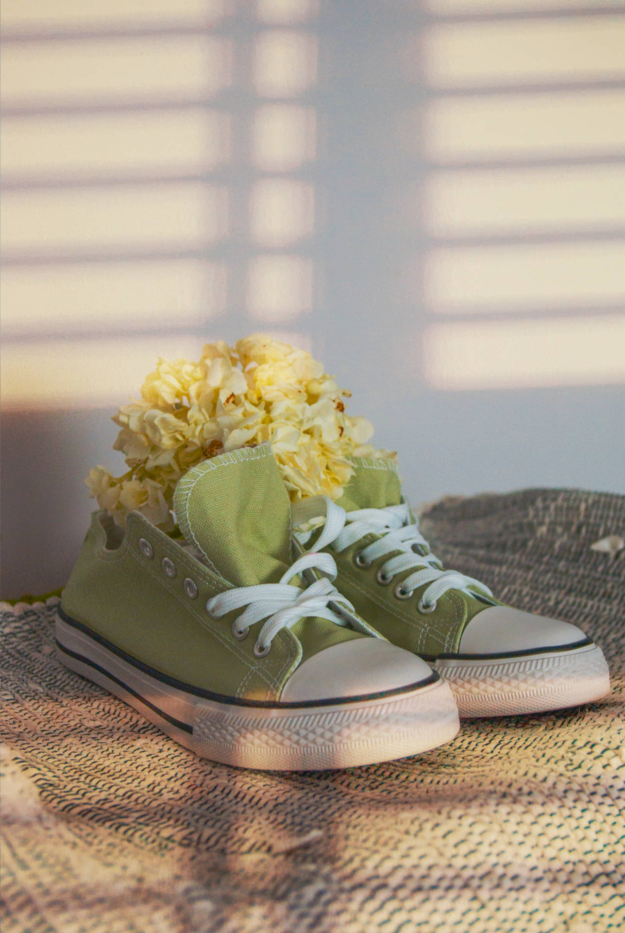 Embrace The Style And Comfort Of These Sleek Green Converse Sneakers. Background