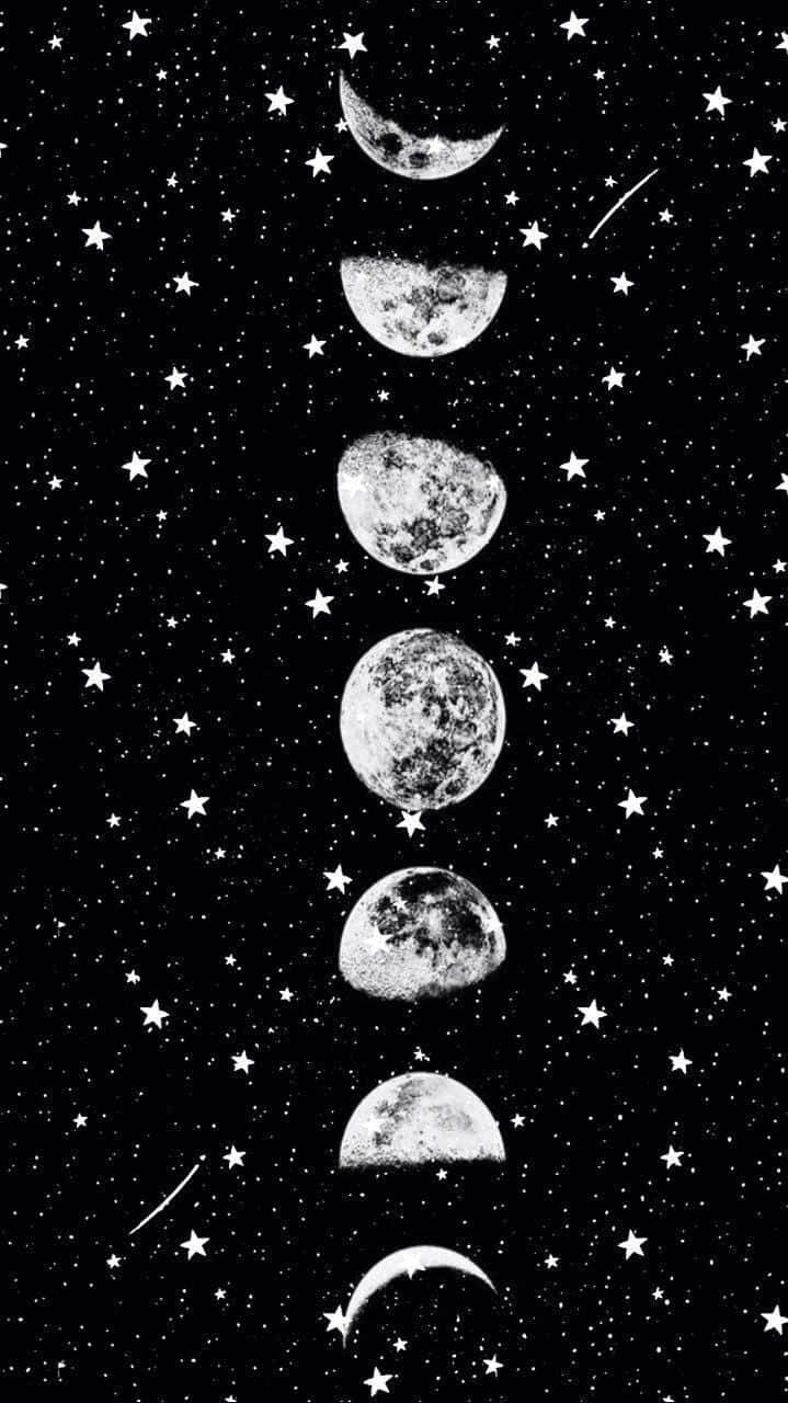 Embrace Tranquility With A Beautiful Night Sky From Moon And Stars Phone Background