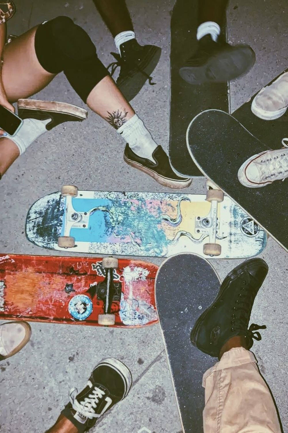 Embracing The Skater Lifestyle: Skate Shoes On Skateboards Background