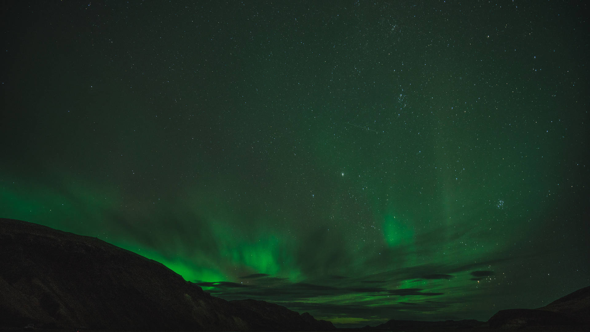 Emerald Green Aurora In Sky Background