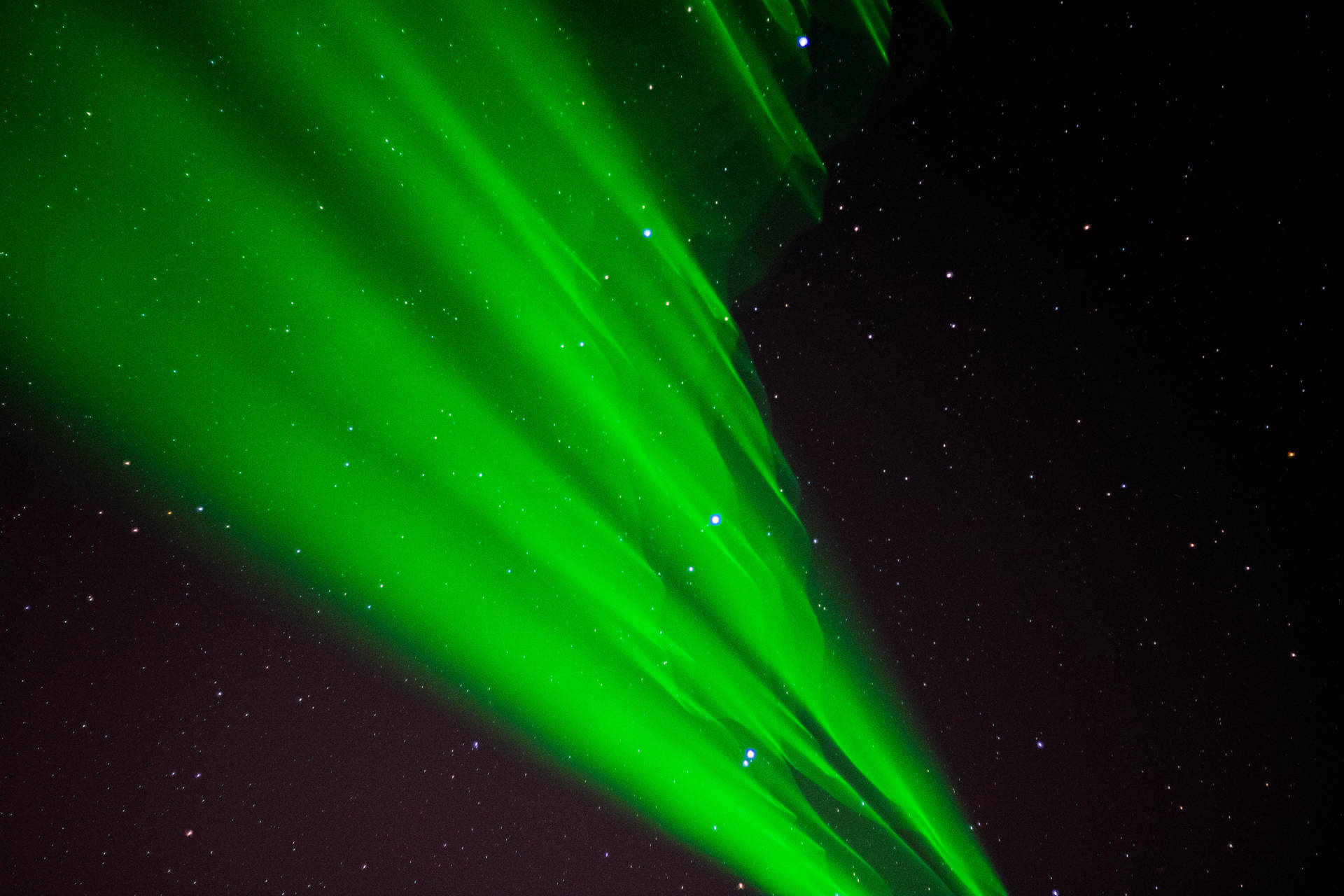 Emerald Green Light In Sky Background